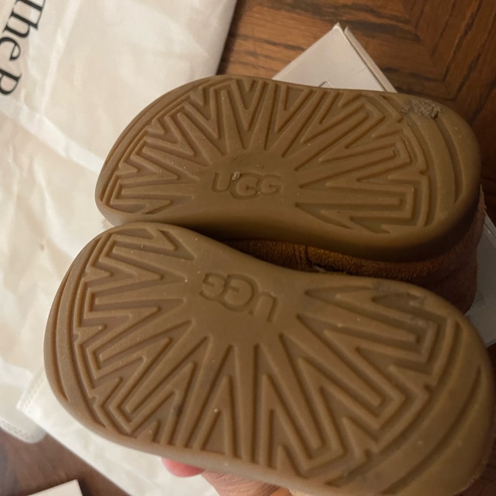 Ugg boots gently used with a stain. - Picture 6 of 7